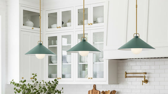 Three Nyra metal pendants in Eucalyptus Green and Brass