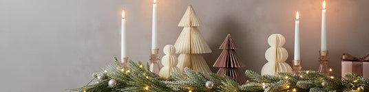 Pink and Green Christmas holiday Decorations with flameless remote control candles and blush glass candle holders