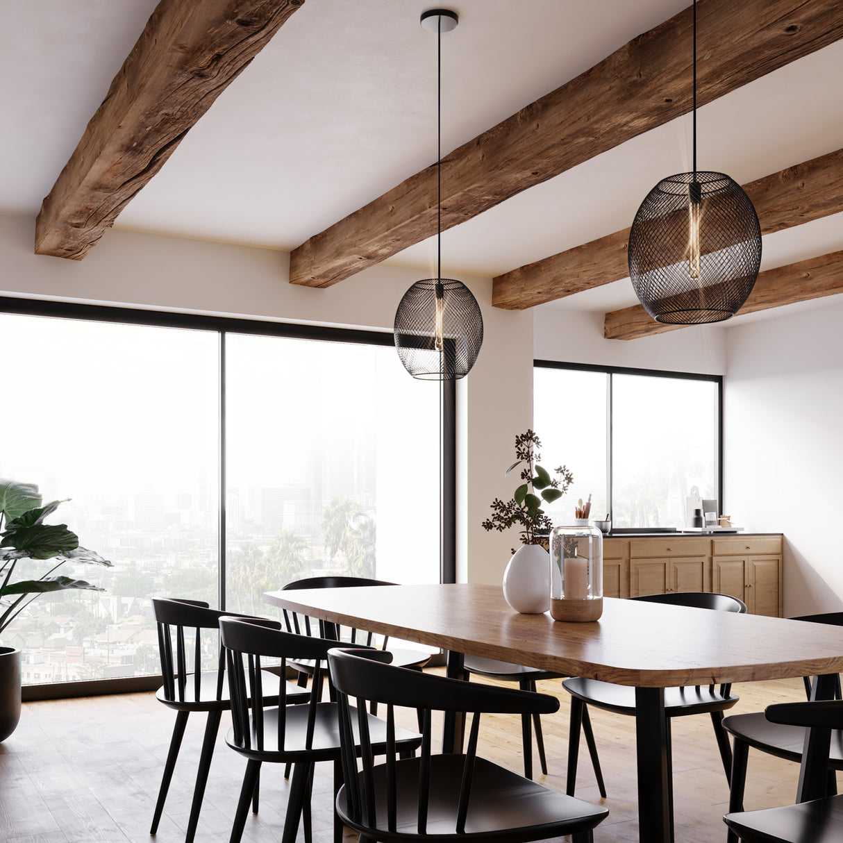 Bergen Oval Mesh Cage Pendant Light, Contemporary, Industrial Design, Use with Vintage Edison Bulbs, Matte Black Finish, Adjustable Height, hung over a dining table