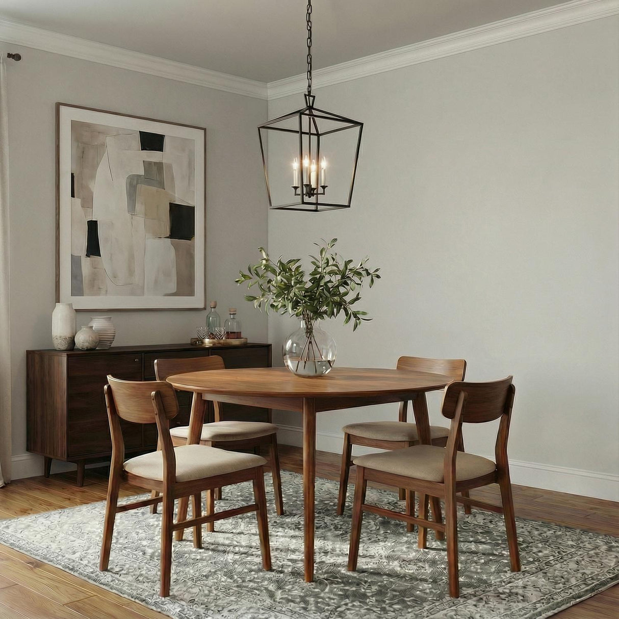 Anover Large Lantern Pendant 17", Matte Black geometric Pendant in a Modern Dining Room with a round oak table and patterned rug.