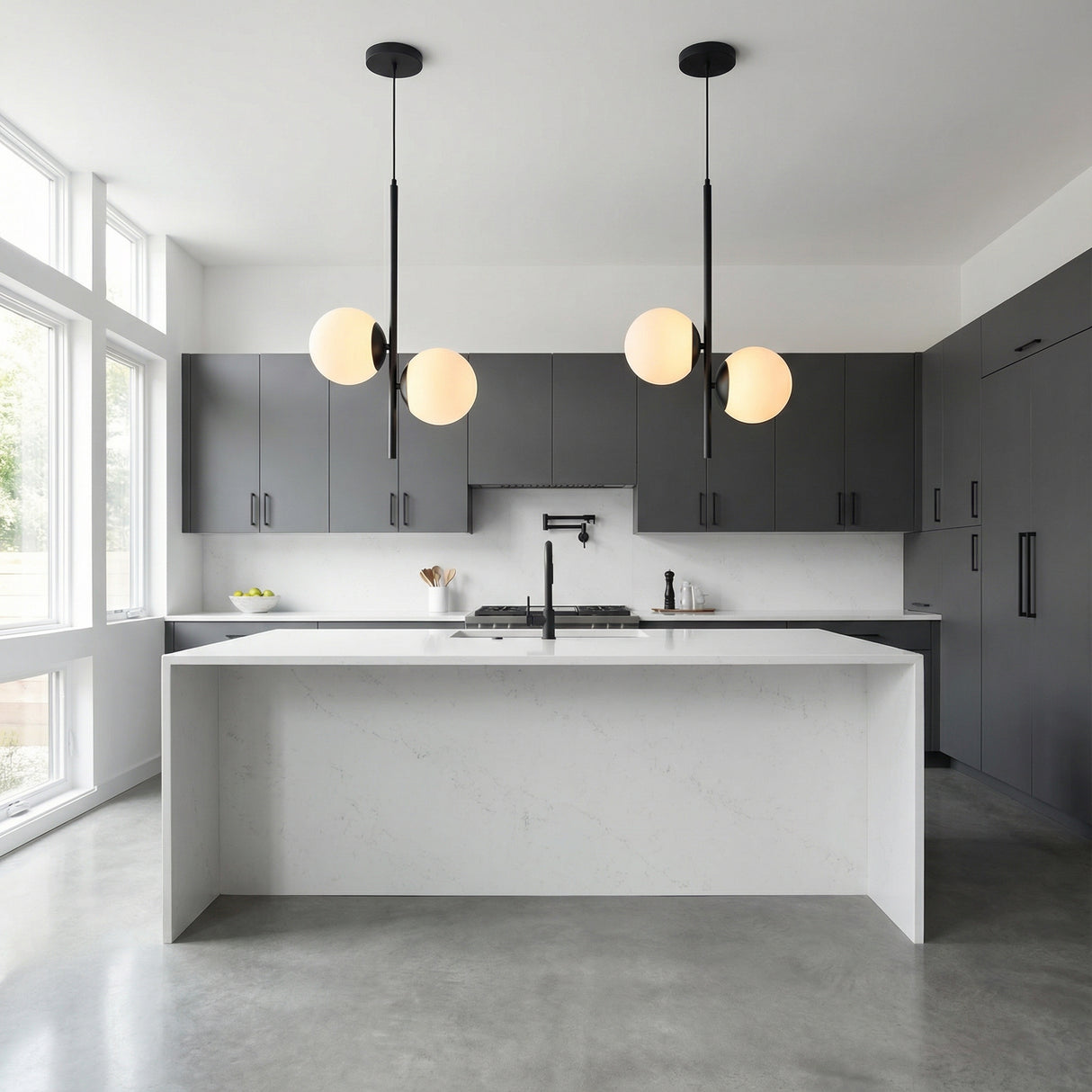 Castell 2 Globe Pendant 15.5", Matte Black globe Pendant in a Modern Kitchen with a white marble island.