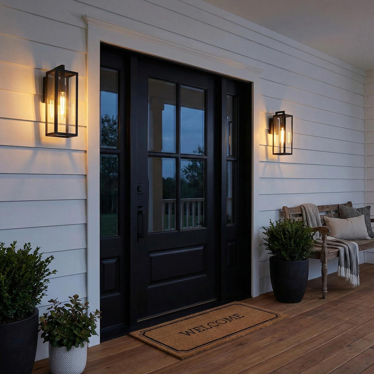 Matte Black linear Outdoor Wall light in a Modern Farmhouse Outdoor Entryway with a wooden bench and welcome mat.
