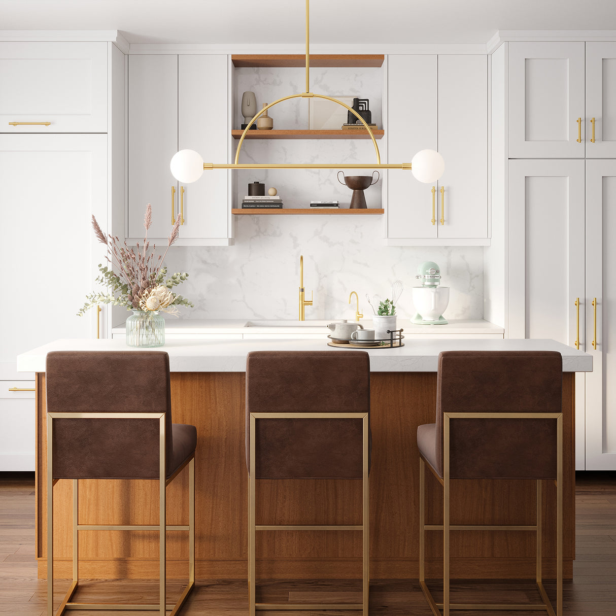 Milo 2 Globe Linear Arc LED Pendant, Aged Brass with white opal glass, hung over a kitchen island, with three leather and brass bar chairs