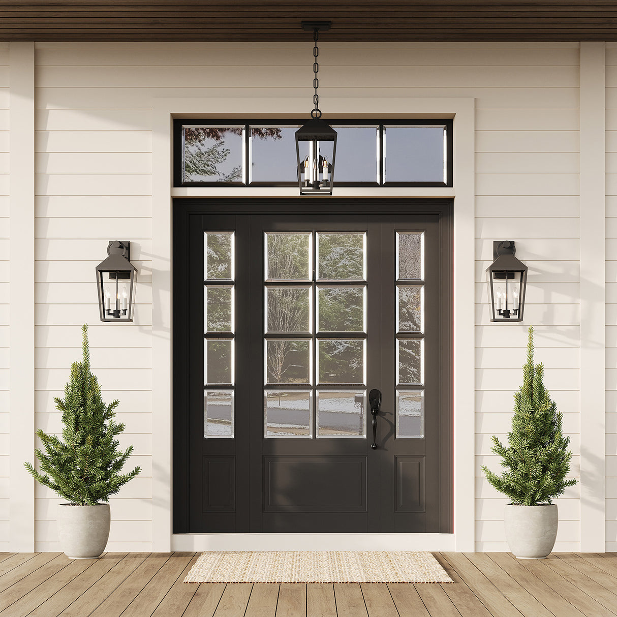 Cole outdoor collection shown with one hanging pendant light and tow Large wall lights in black