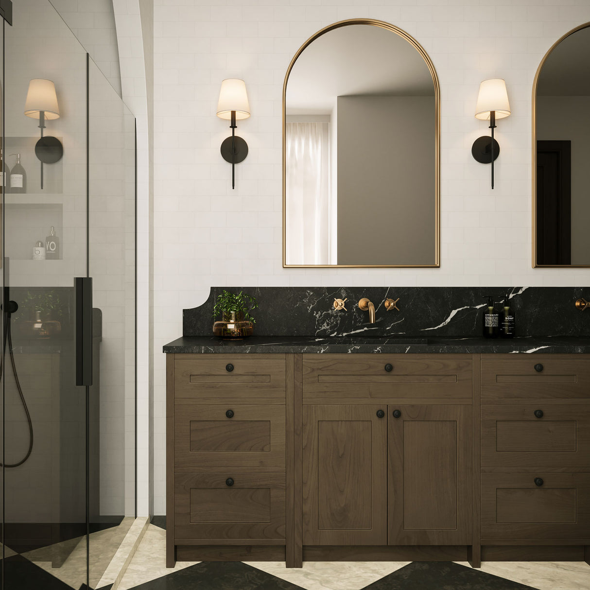 Two Taylor 19" Wall Sconces, Matte Black with White Fabric Shade, shown in a traditional luxe bathroom, flanking an arched vanity mirror.