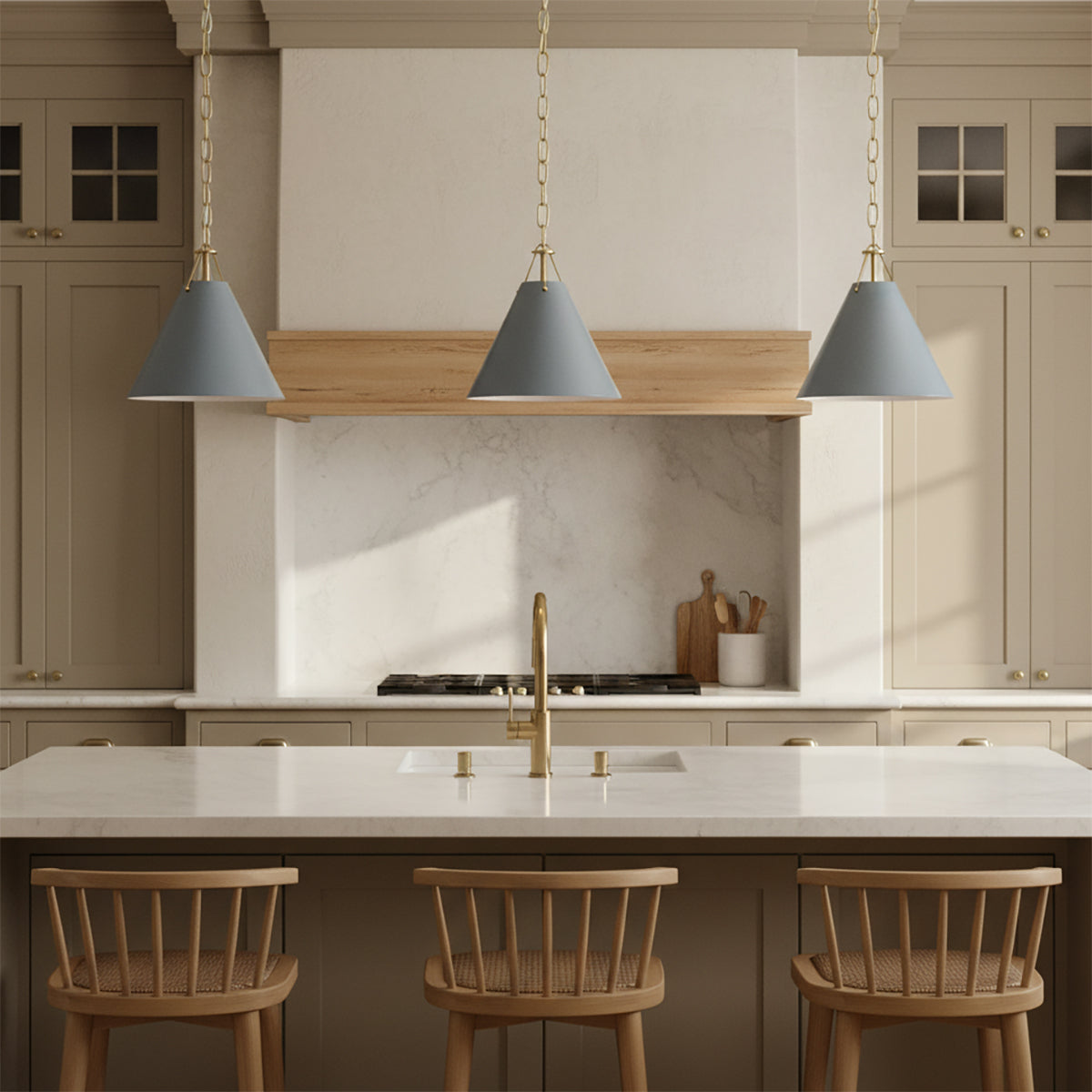 Bowie Small Metal Pendant 12, French Blue and Brass - Three blue pendants hanging over a kitchen island