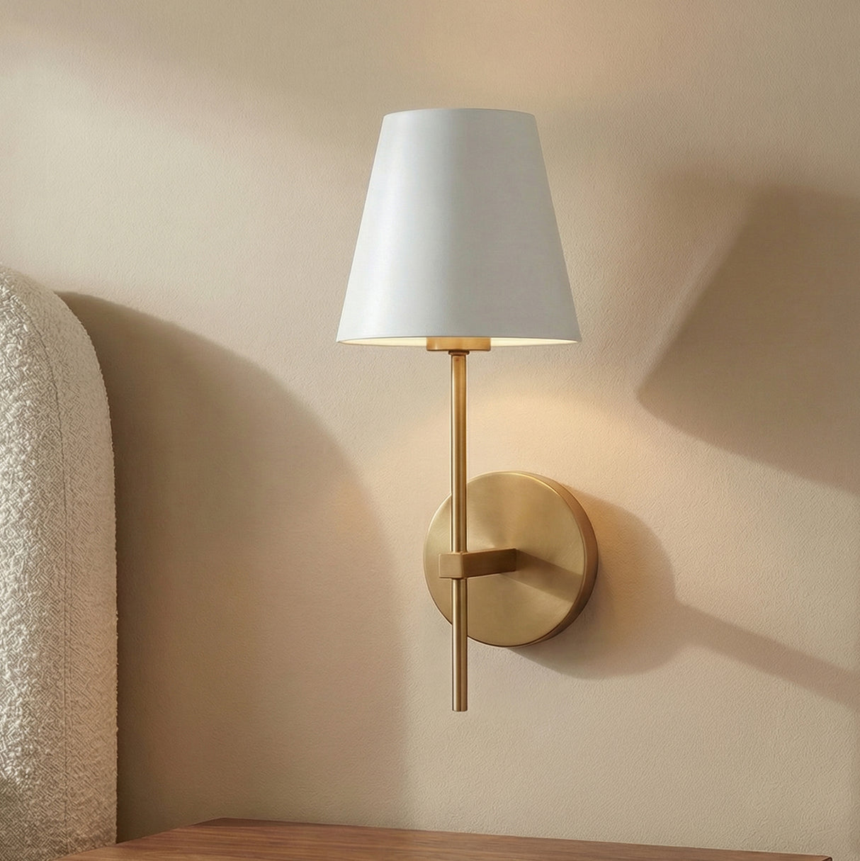 Banks Wall Sconce, White and Brass geometric Wall Sconce in a Transitional Bedroom with a textured headboard and wood nightstand.