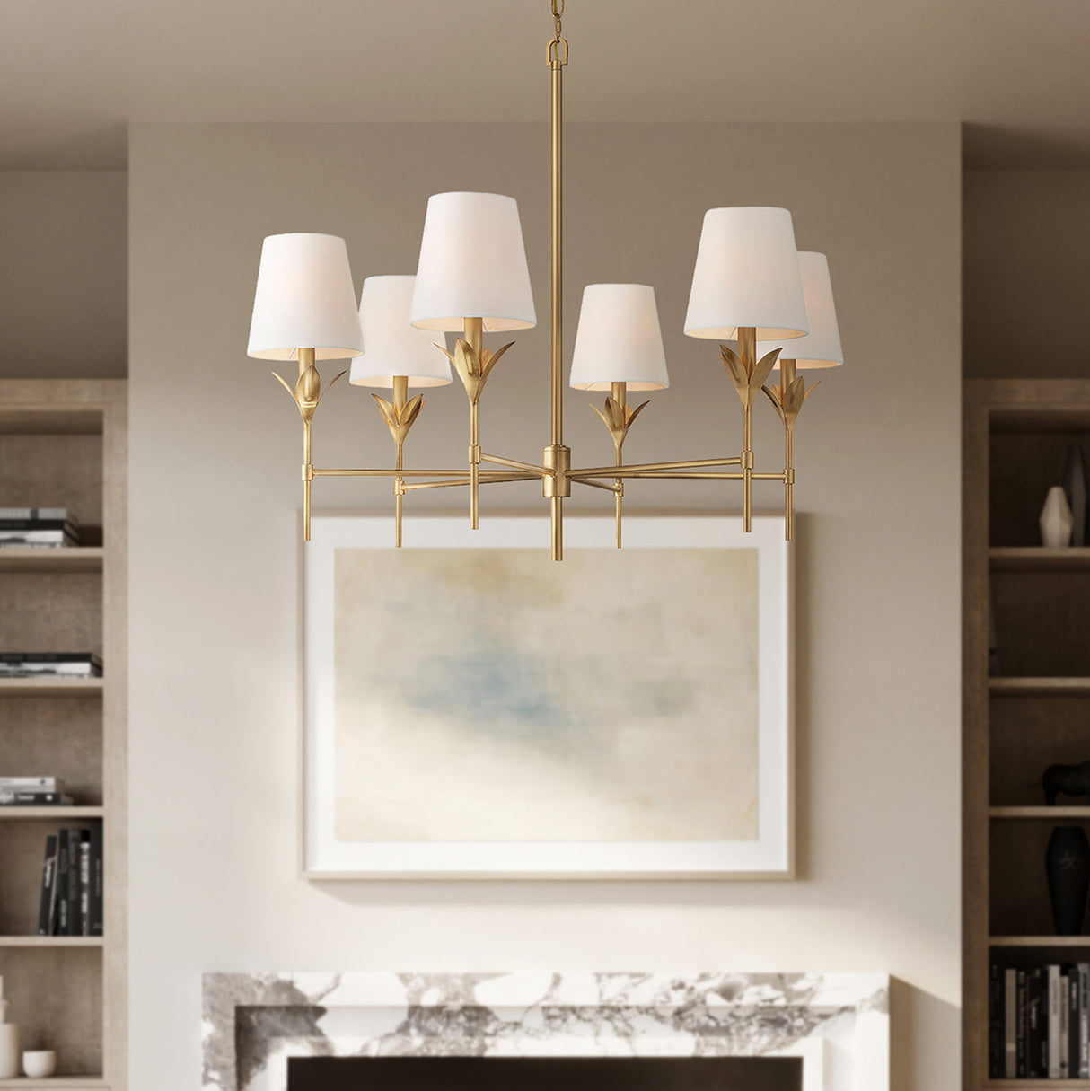 Alice 6 Light Chandelier 32", Antique Gold, shown in a living room with modern art on the wall.