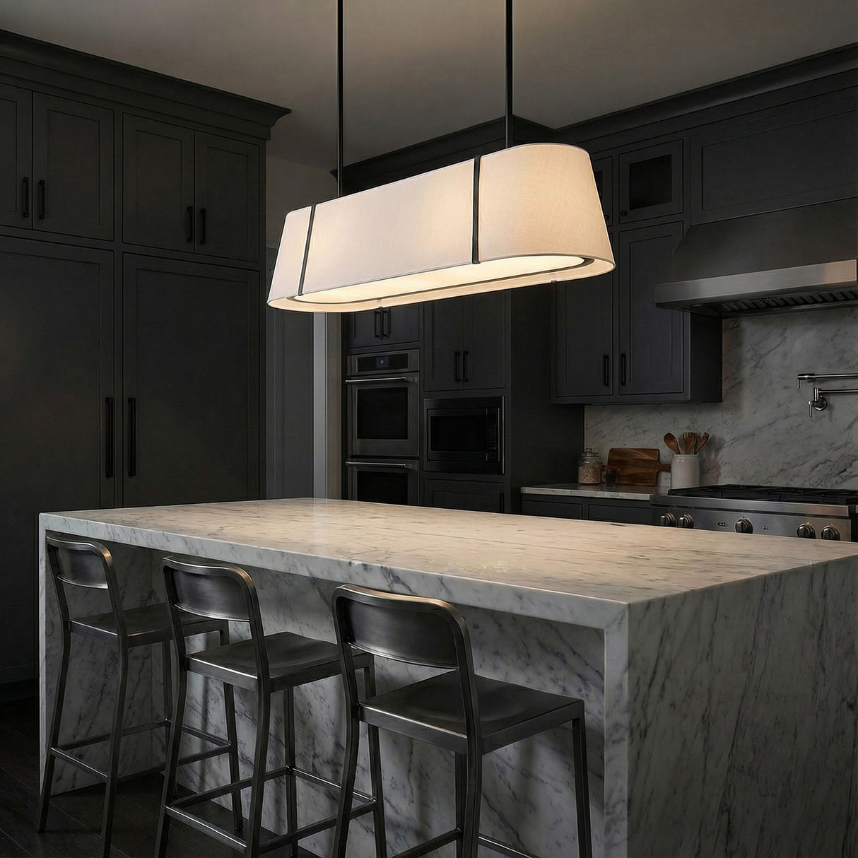 Hoyt Linear Pendant 42", Black linear pendant in a Transitional Kitchen with a white marble island.
