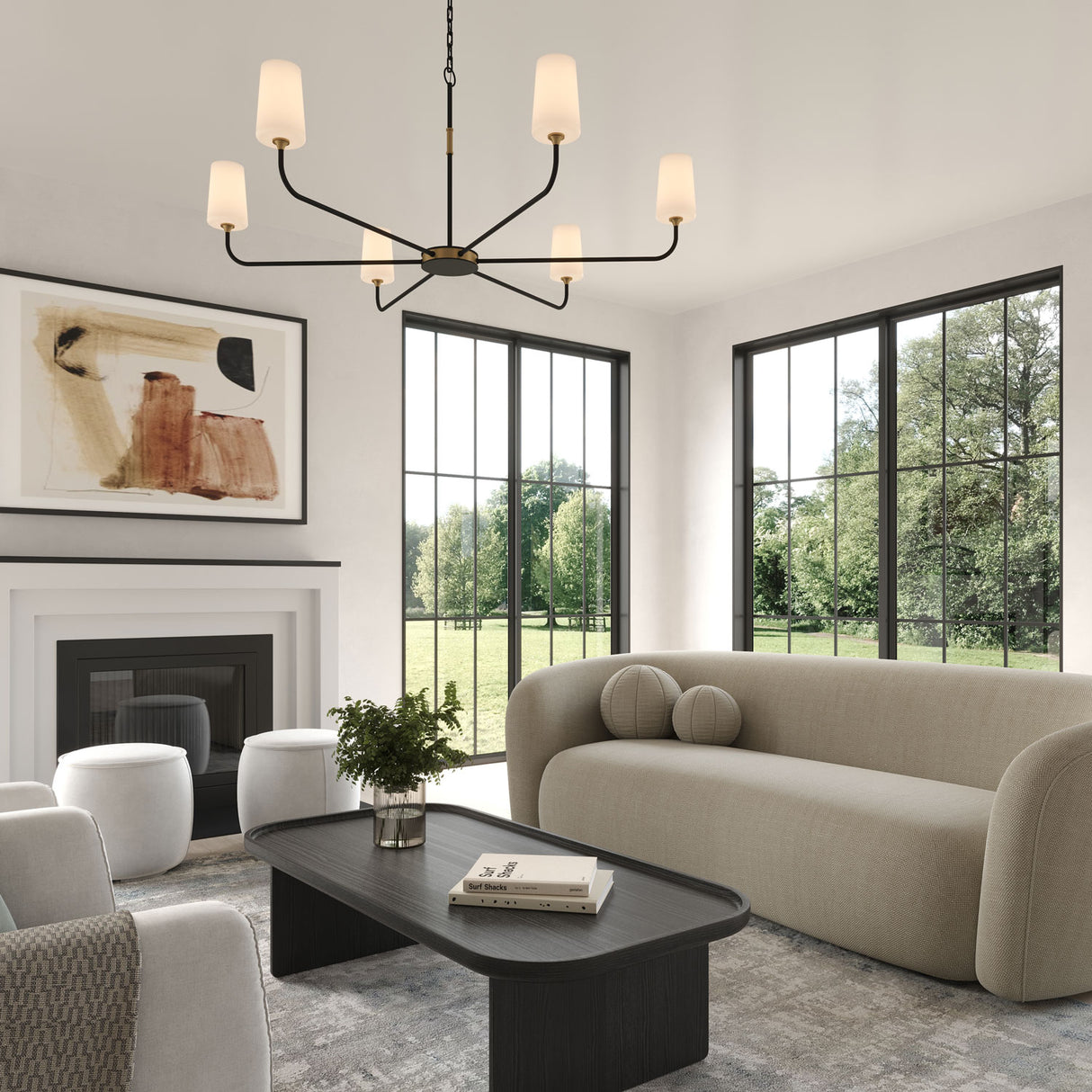 Logan 6 Light Chandelier is 54” in daimeter, and finished in Black and Brushed Brass with white opal glass shades