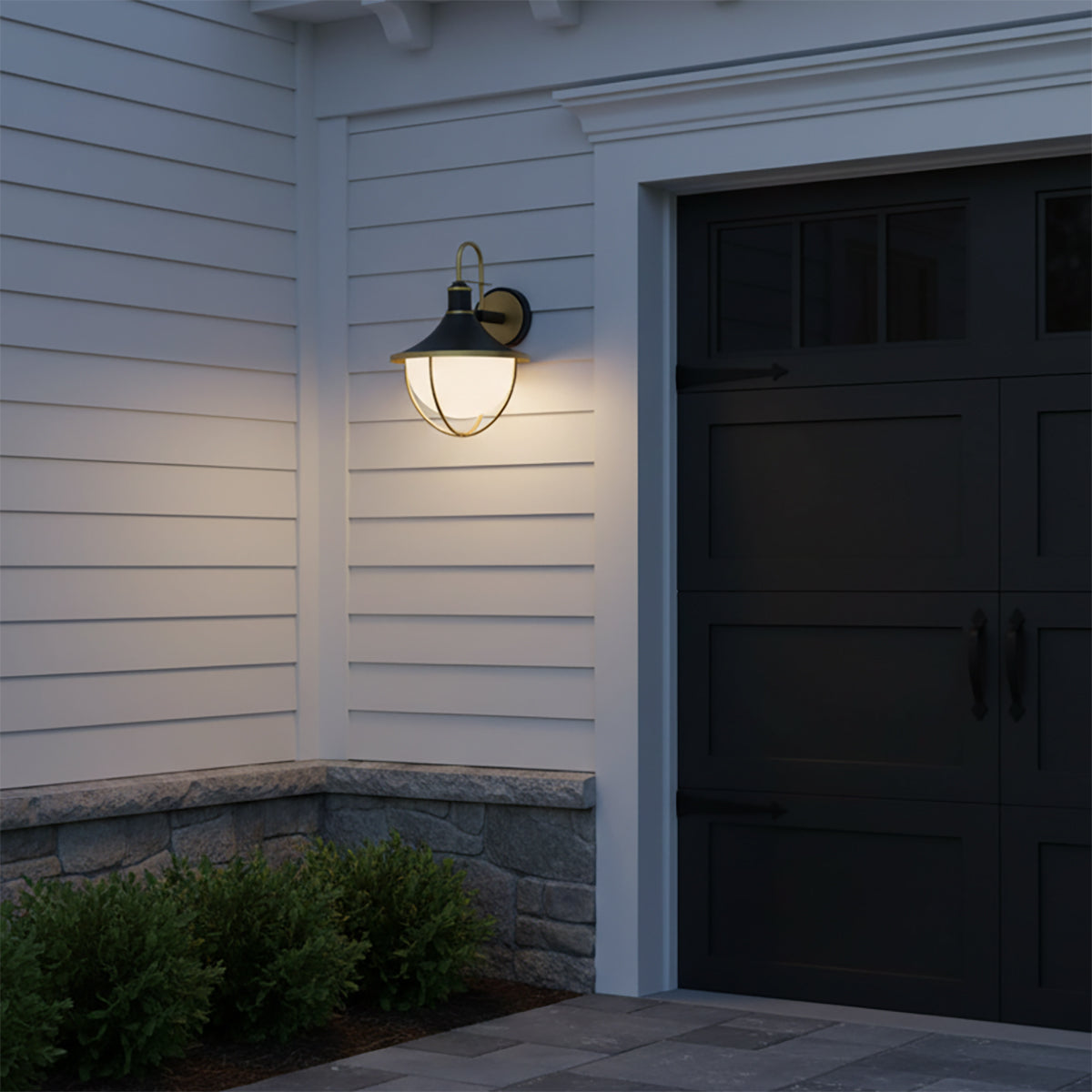 Tobin Outdoor Wall Light, Medium 19" Black and Textured Gold - An outdoor wall light mounted next to a garage door.