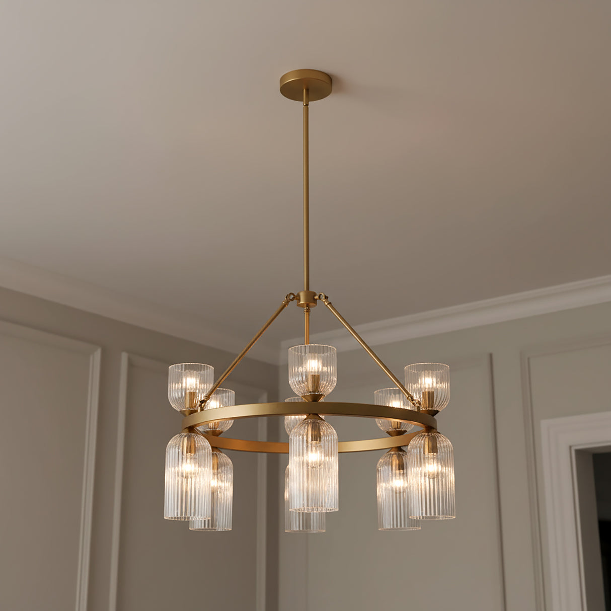 Elle Chandelier 26, Brushed Brass and Clear Glass for Transitional home with Gray Wall Panels