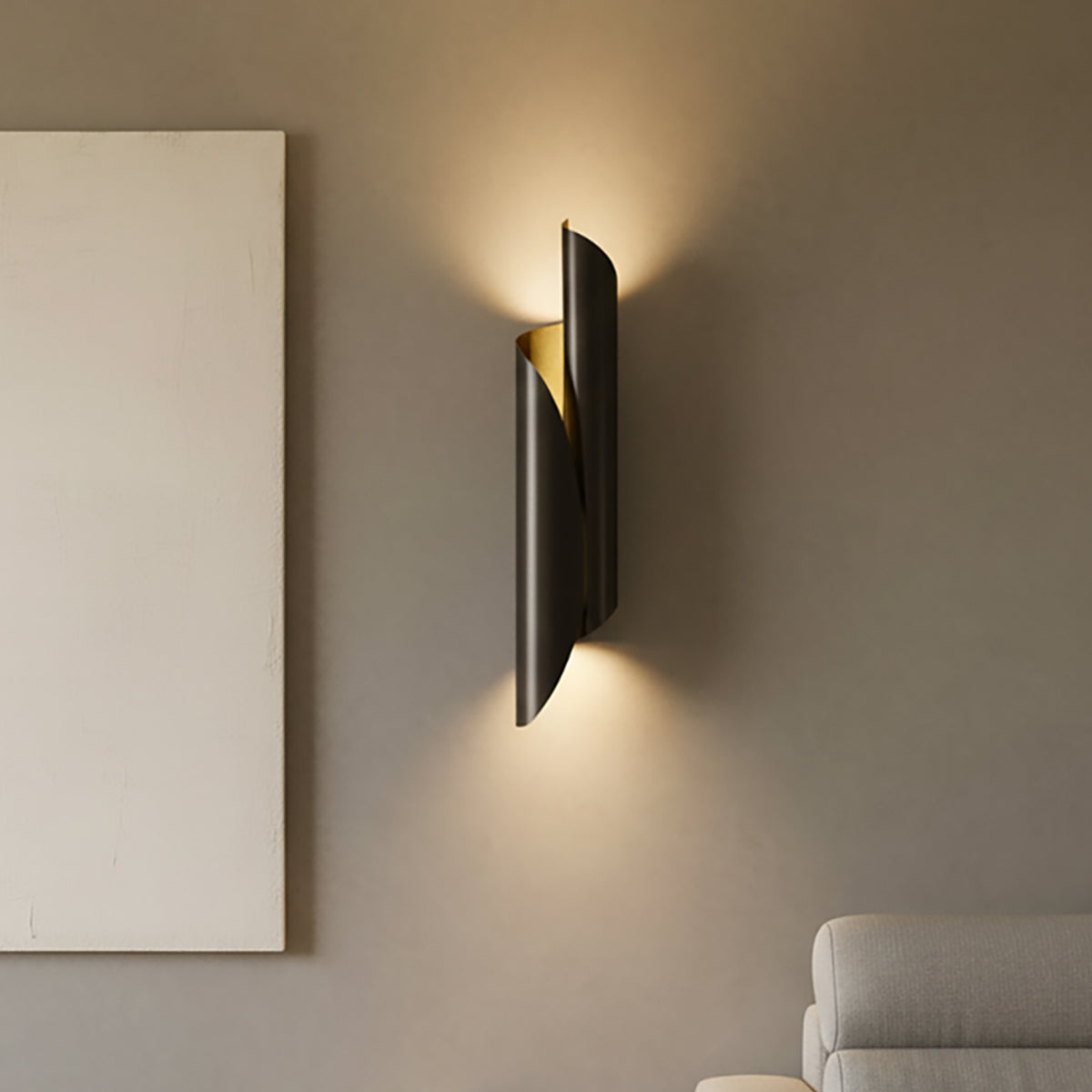 Isla Wrapped Wall Sconce 26", Urban Bronze with Brushed Gold finish, shown in a theater room.