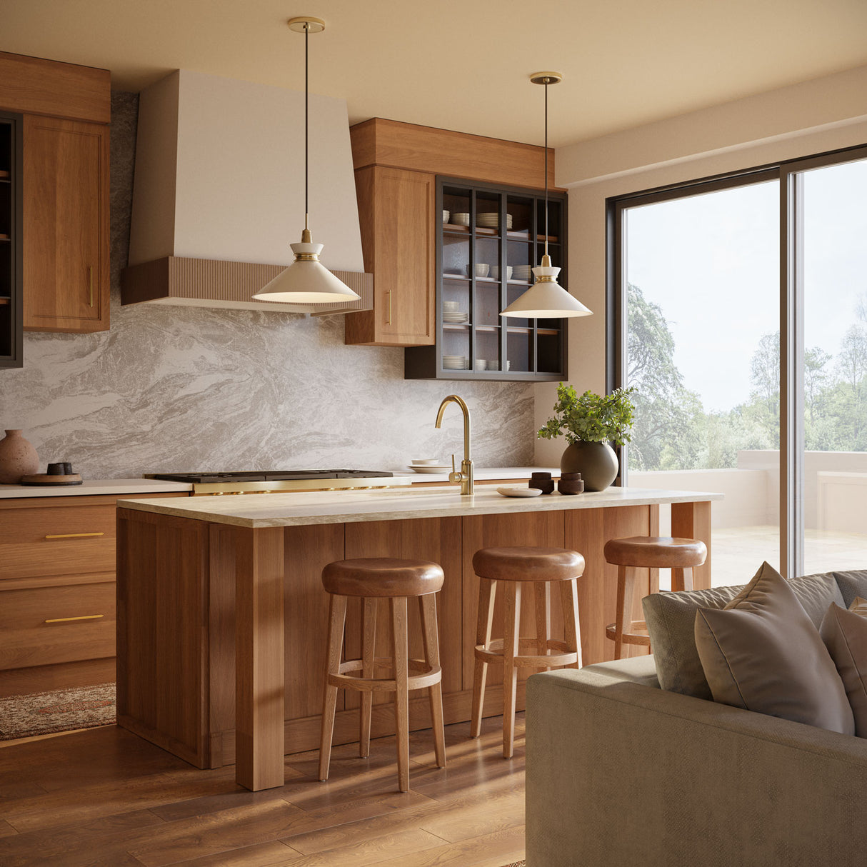 Two Sadie Large Pendant s, 18”, Cream and Aged Brass hung in a contemporary kitchen with oak cabinets and a grey stone slab backsplash.