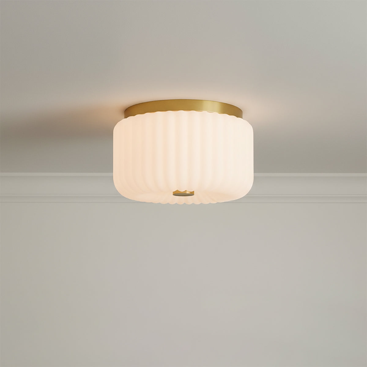 Dora Flush Mount 10, Aged Brass with Opal Glass - Close-up of brass and opal glass flush mount ceiling light