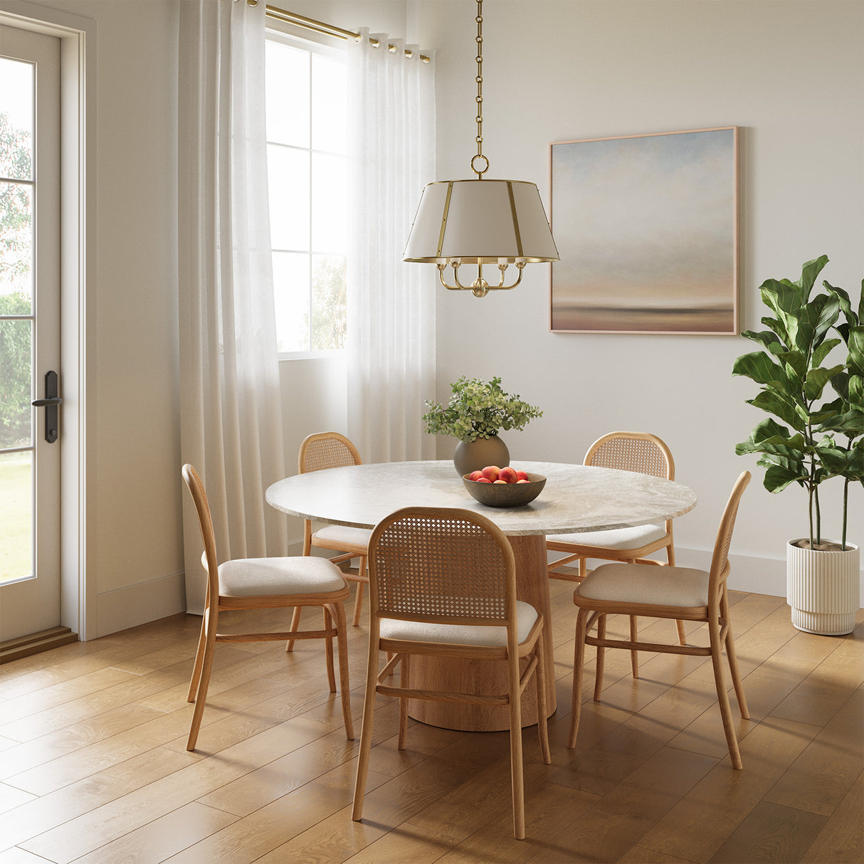 Bright and airy dining room with cane backed bent wood chairs, a marble topped round table for five, and the Avery 4 Light Pendant Light in off-white and aged brass finish hanging above.