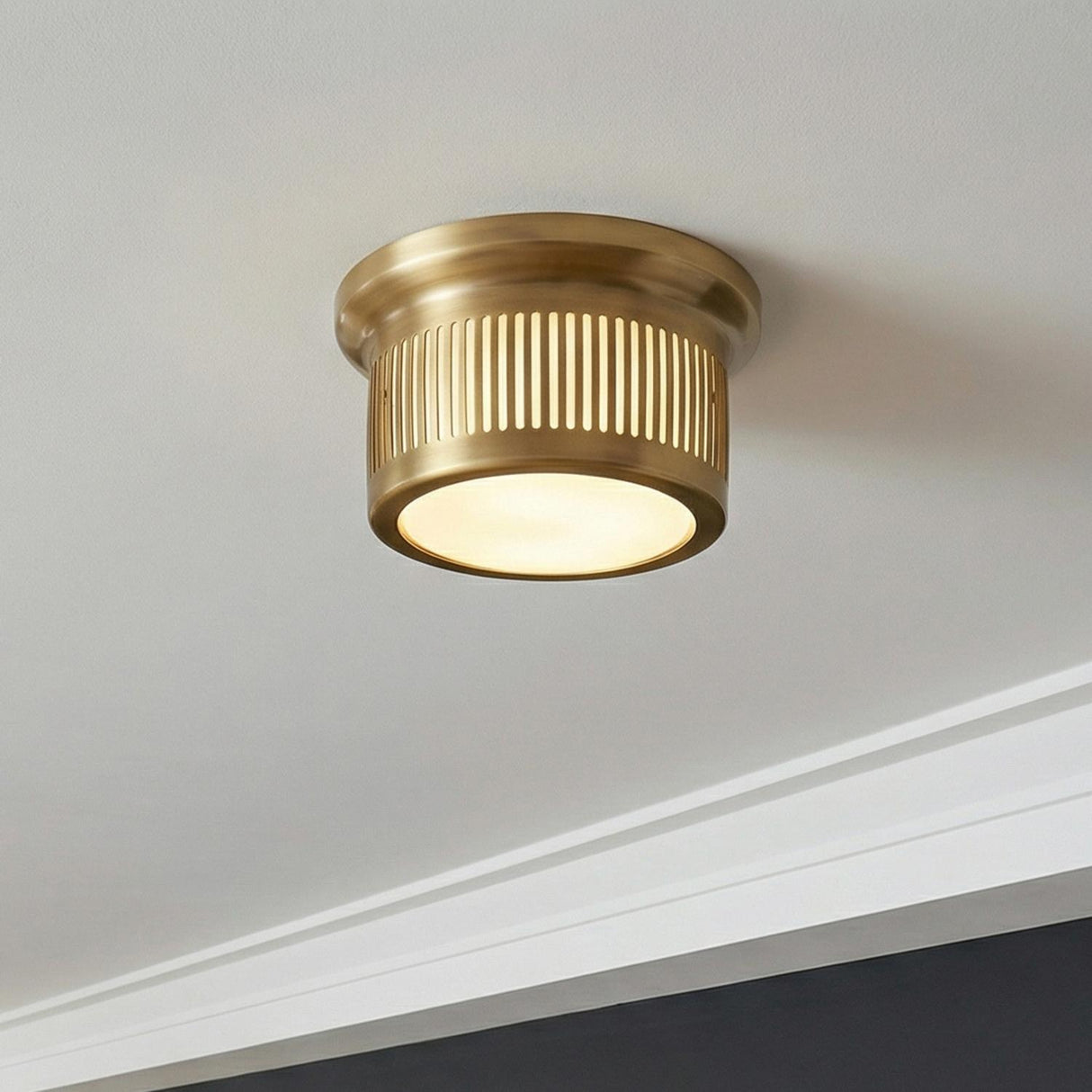 Vann LED Flush Mount 6", Aged Brass linear flush mount in a Transitional Hallway with white crown molding and dark grey walls.