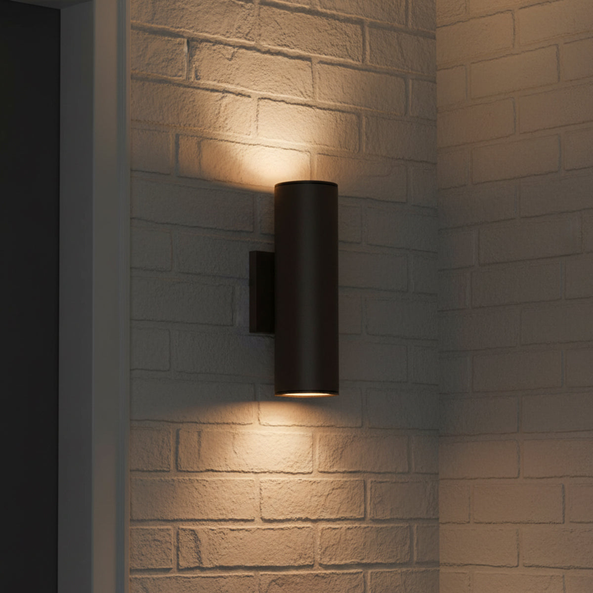 Beck Outdoor Cylinder Wall Light, 15" Bronze for Modern home with White Brick