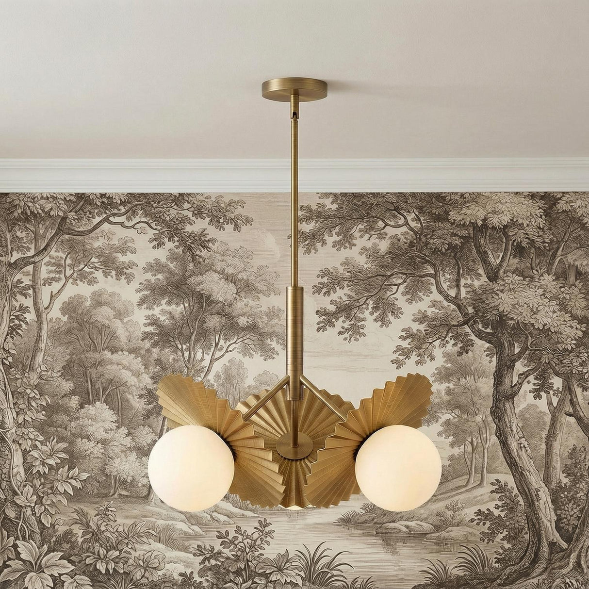 Lydia 3 Light Pendant 21", Brushed Brass and Opal Glass scalloped Chandelier in a Transitional Living Room with scenic toile wallpaper.