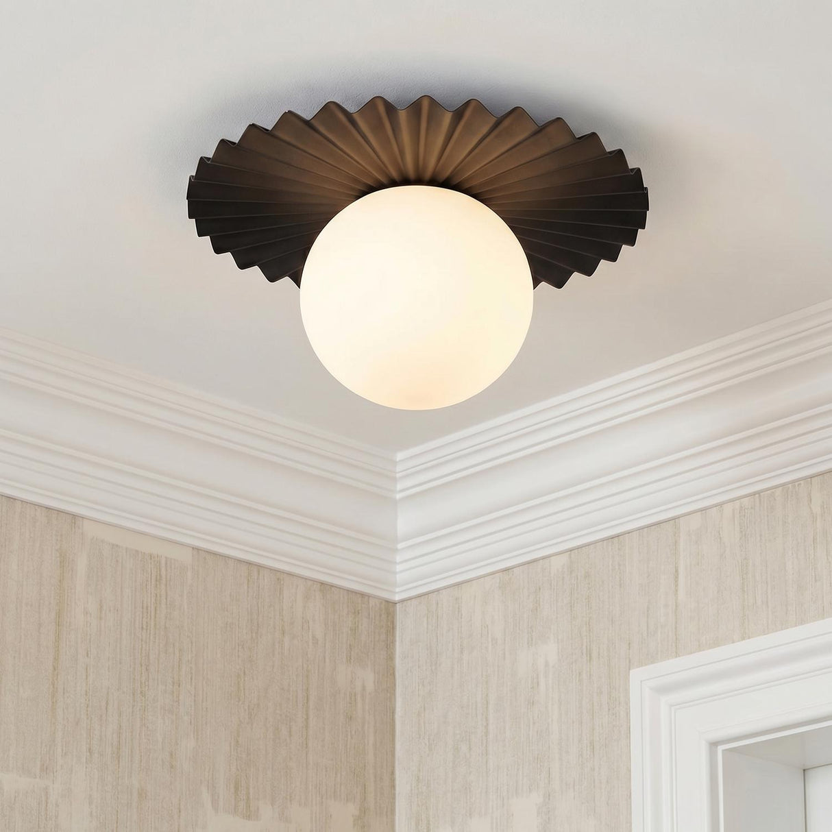 Lydia Flush Mount 14", Black and Opal Glass scalloped flush mount in a Transitional Hallway with crown molding and wallpaper.