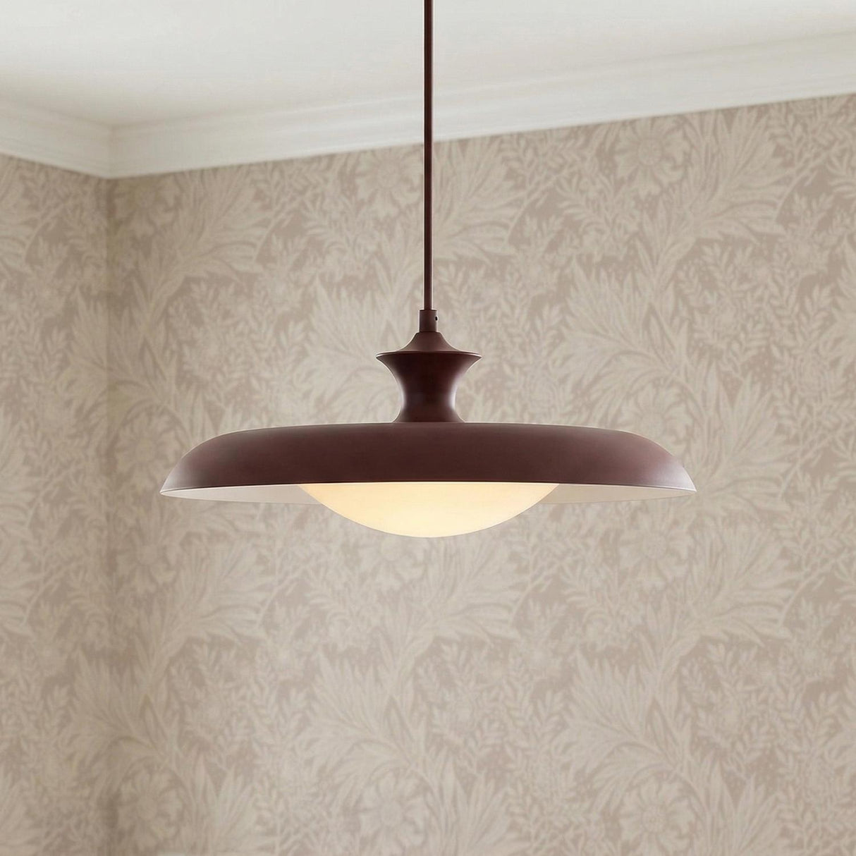 Mabel Metal Pendant 15", Maroon with Opal Glass geometric saucer pendant in a Transitional Dining Room with patterned floral wallpaper.