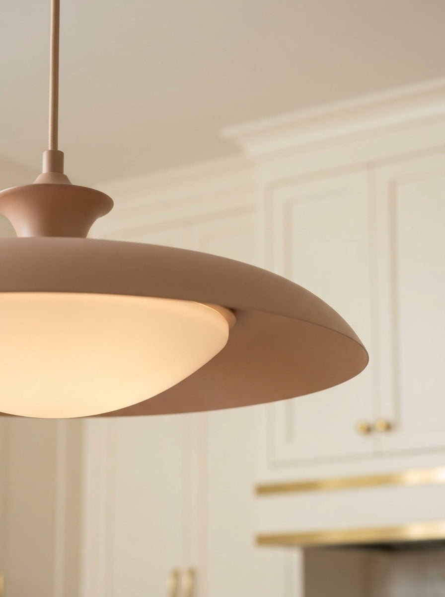 Mabel Metal Pendant 15, Blush with Opal Glass styled in a Modern Kitchen with cream cabinets.
