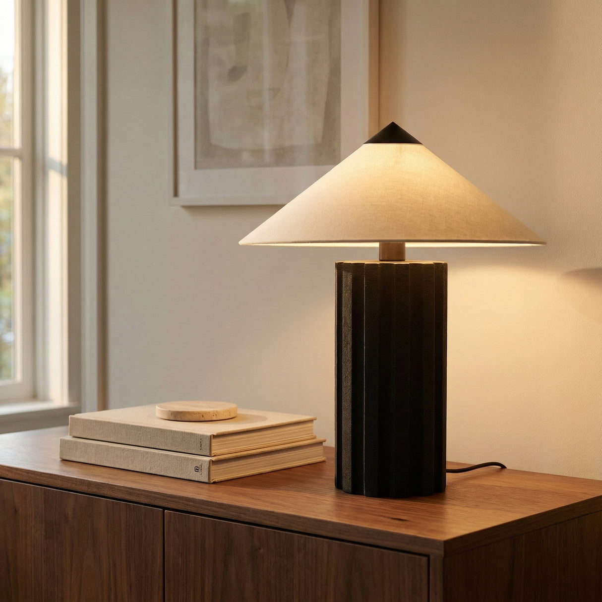 Lee Table Lamp, Textured Black geometric Table Lamp in a Modern Living Room with a dark wood credenza.