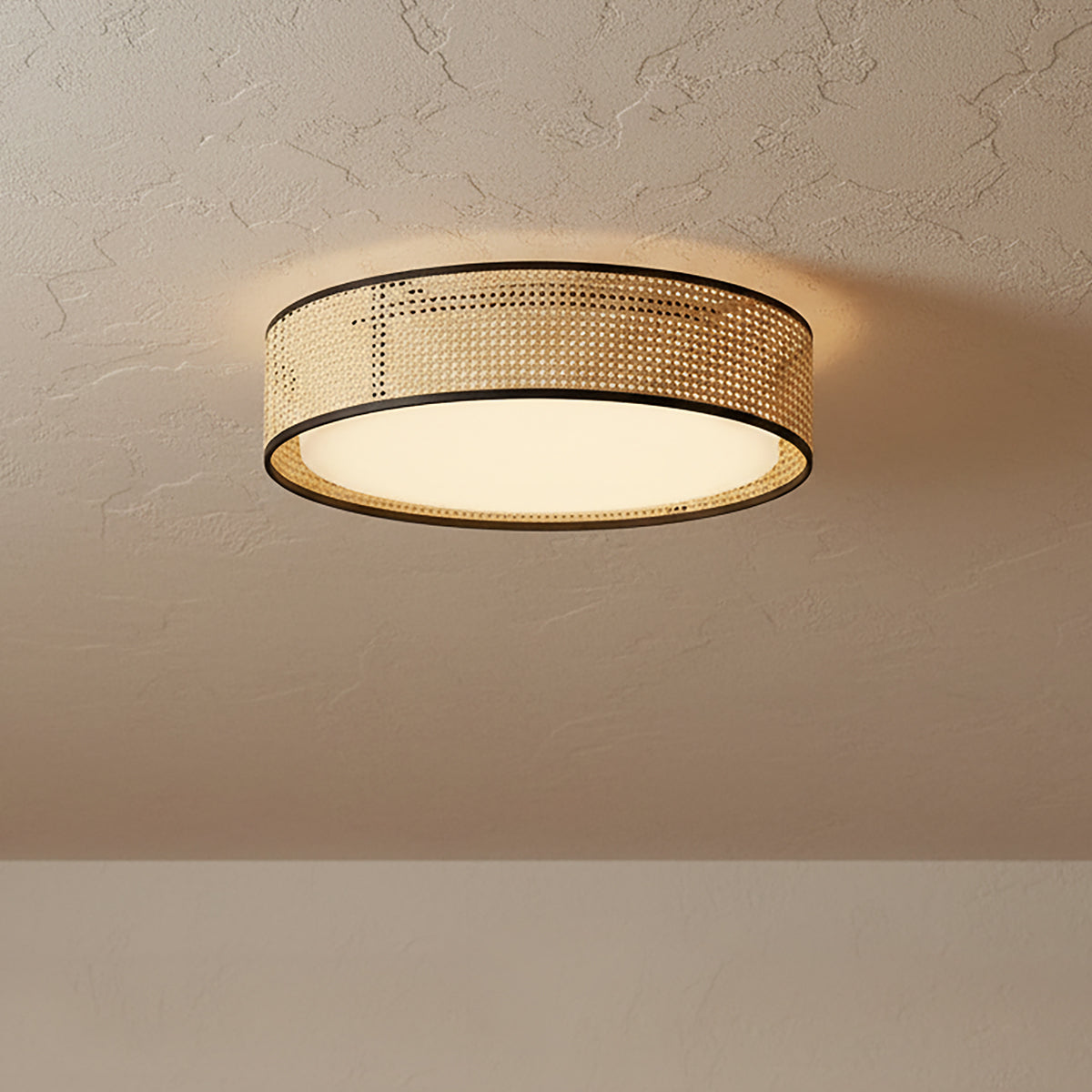 Amaris LED Flush Mount 20, Cane with Black Accents - Round flush mount with cane shade and black accents against a textured ceiling