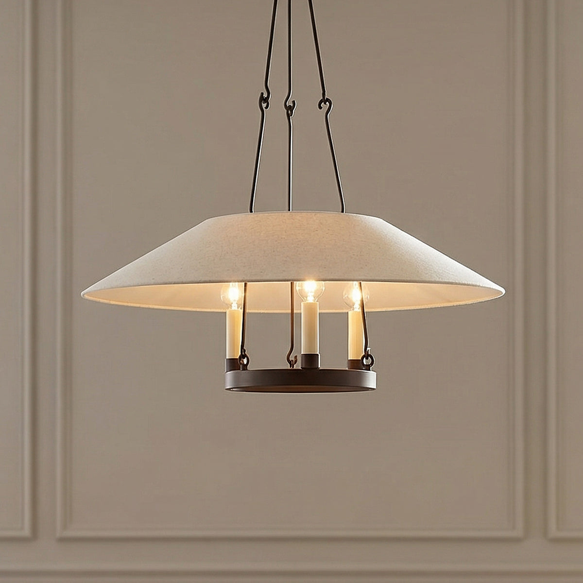 Dawson Pendant 25", Bronze with Linen Shade woven pendant in a Transitional Dining Room with a classic paneled wall.