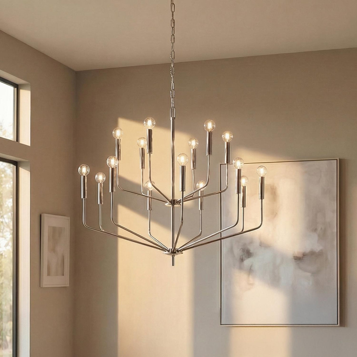 Hollis 15 Light Two-Tier Chandelier 36", Polished Nickel geometric chandelier in a Modern Living Room with abstract wall art.