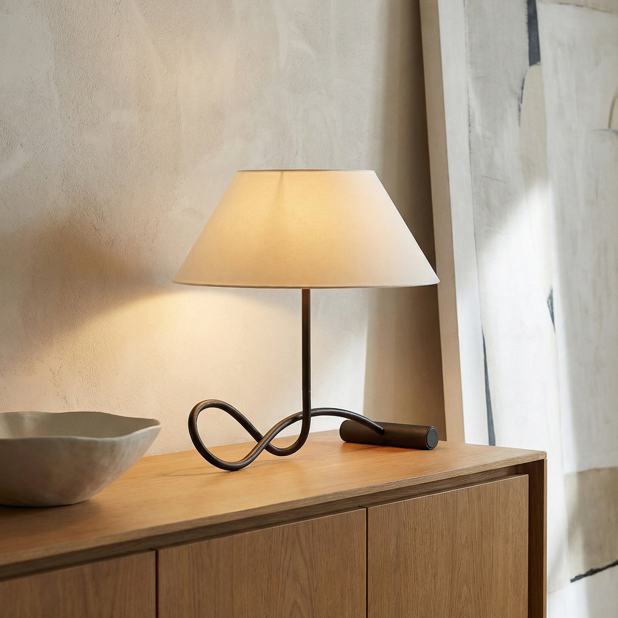 Odin Table Lamp, Forged Iron geometric Table Lamp in a Modern Living Room with an oak wood cabinet.