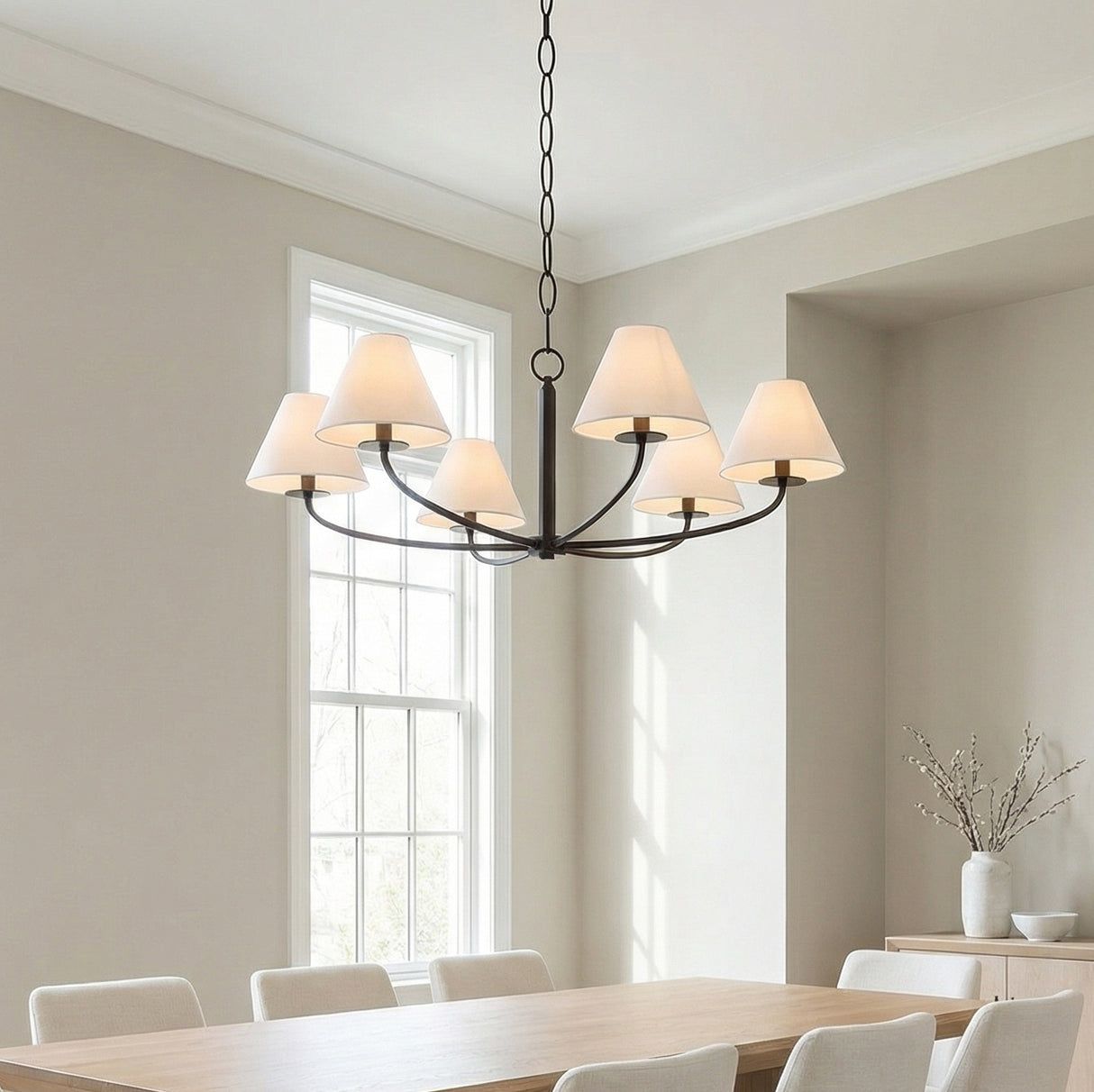 Morgan 6 Light Chandelier 40", Old Bronze geometric chandelier in a Transitional Dining Room with a light wood dining table.