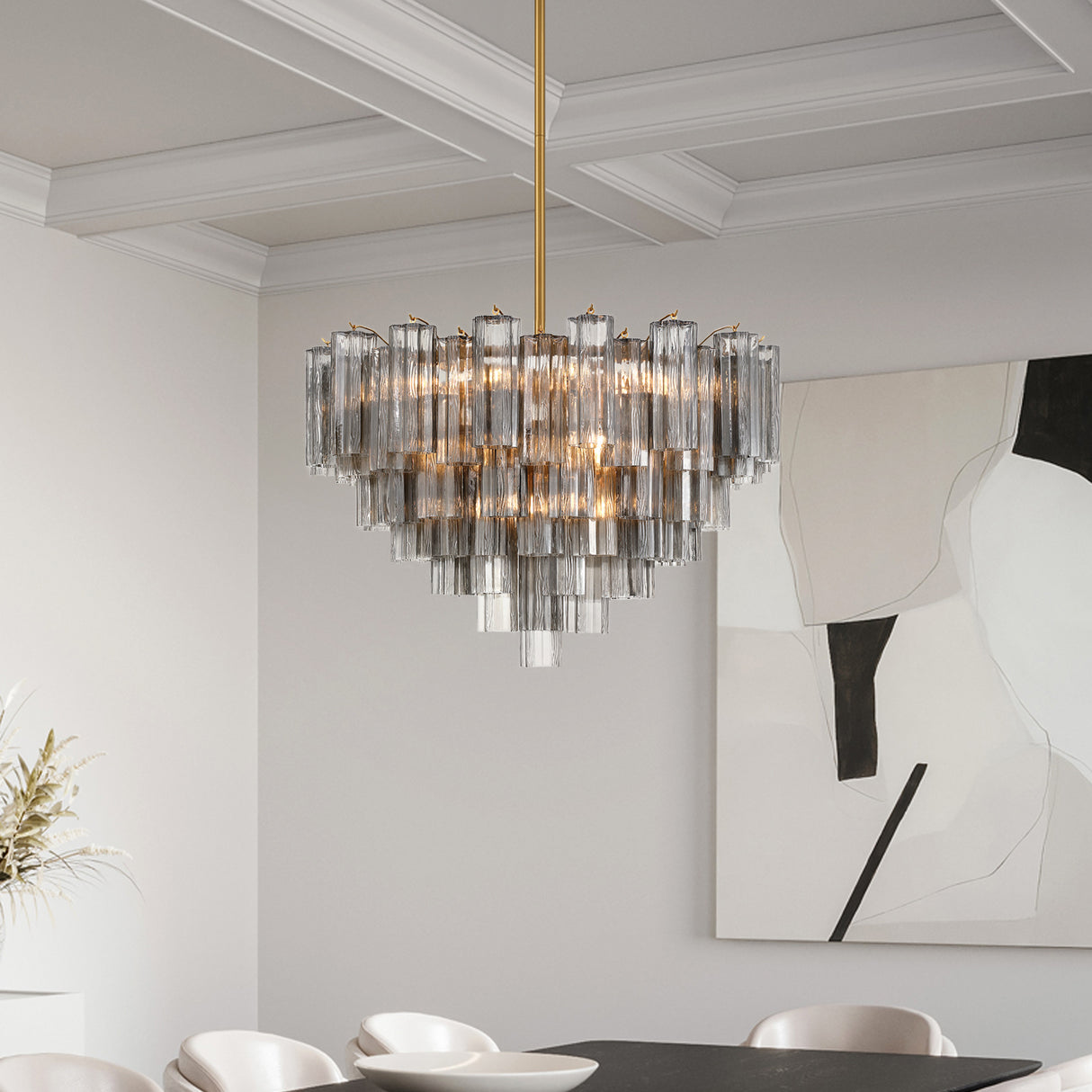 Grace 16 Light Chandelier in Brass with Smoke Glass, shown in a contemporary dining room with modern art.