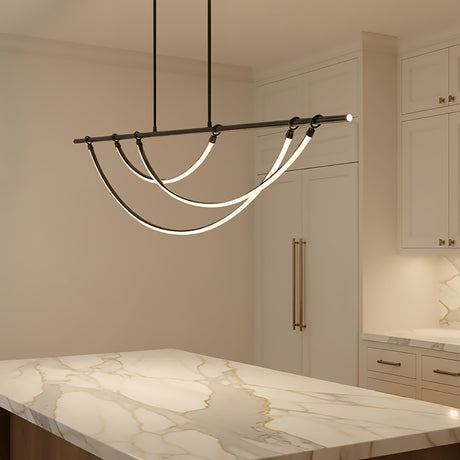 Otis Linear LED Pendant 60, Urban Bronze - A modern linear pendant hangs above a marble countertop in a kitchen.