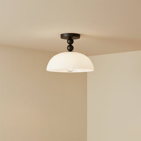 Archie Flush Mount 12, Matte Black and Opal Glass - Flush mount light fixture against a neutral colored wall.