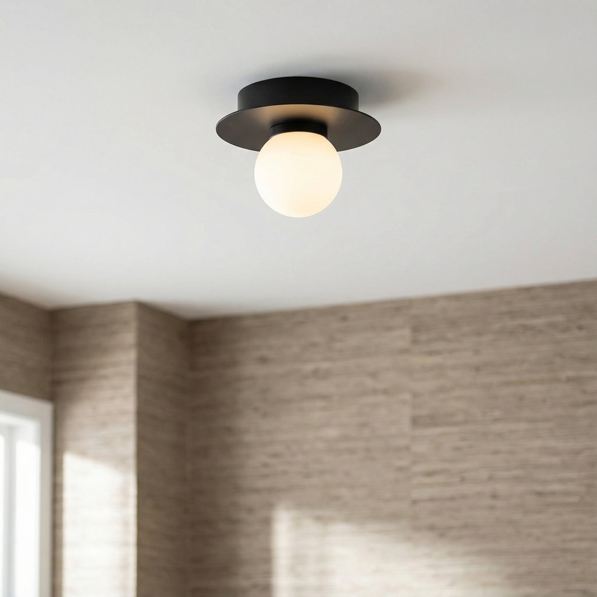 Sol LED Flush Mount 6", Matte Black for Modern home with Natural Wood Siding