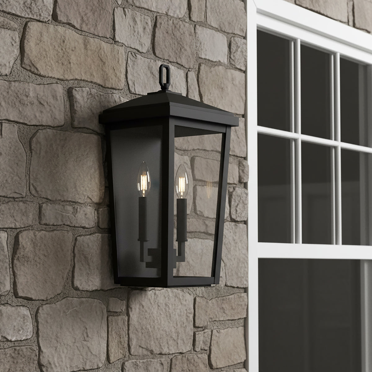 Black Leighton Outdoor Wall Light, Small 15" light fixture on a stone wall next to a window.
