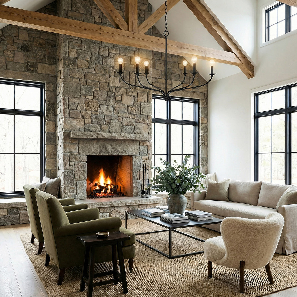 Oriana 6 Light Chandelier 40", Matte Black linear chandelier in a Modern Farmhouse Living Room with a stone fireplace.
