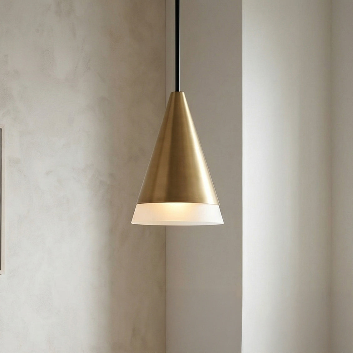 Astra Pendant, Aged Brass and Black geometric Pendant in a Contemporary Dining Room with textured plaster walls.