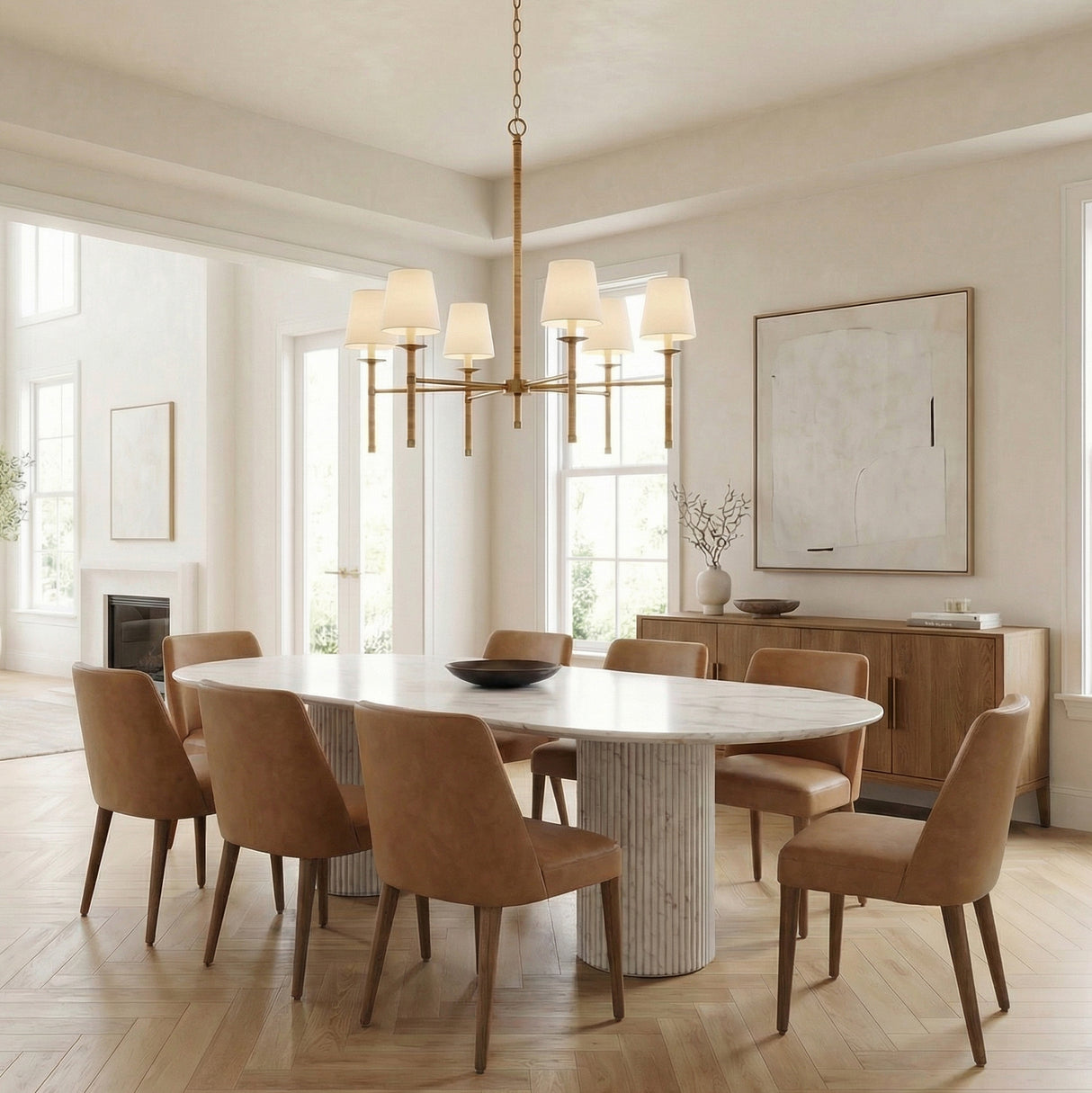 Faris 6 Light Chandelier 38", Matte Brass with Rattan woven Chandelier in a Transitional Dining Room with an oval marble dining table.