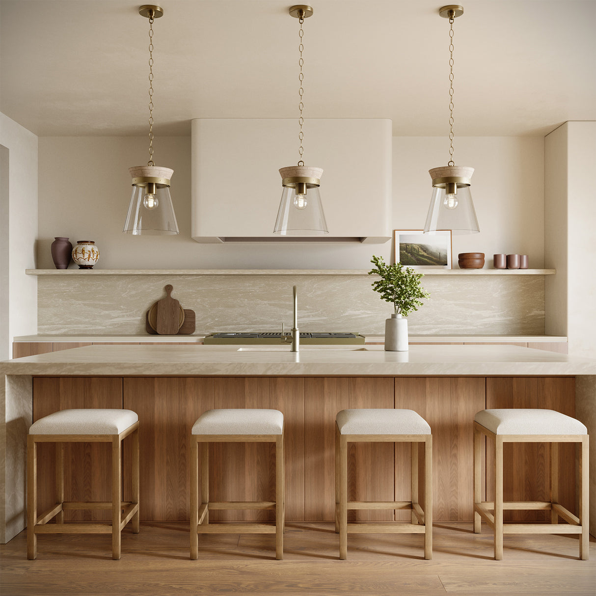 Modern organic kitchen with three Maren 12" pendant lights, bar stools, and a neutral color palette.