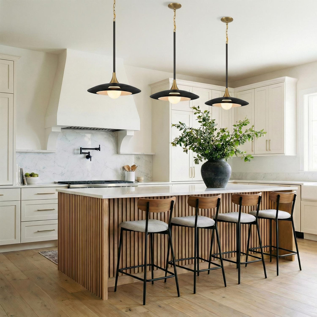 Yates Matte Black geometric globe pendant in a Modern Farmhouse Kitchen with a white marble island and wood slat base.
