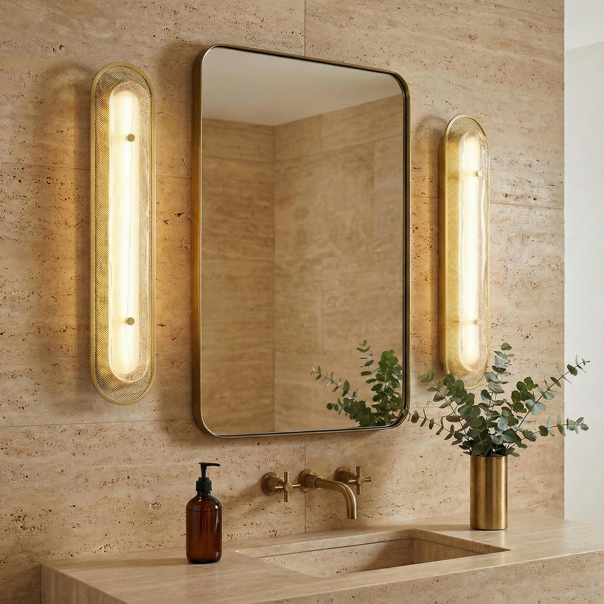 Vance LED Wall Sconce 30", Brass and Textured Glass styled in a Modern Bathroom with travertine tile.