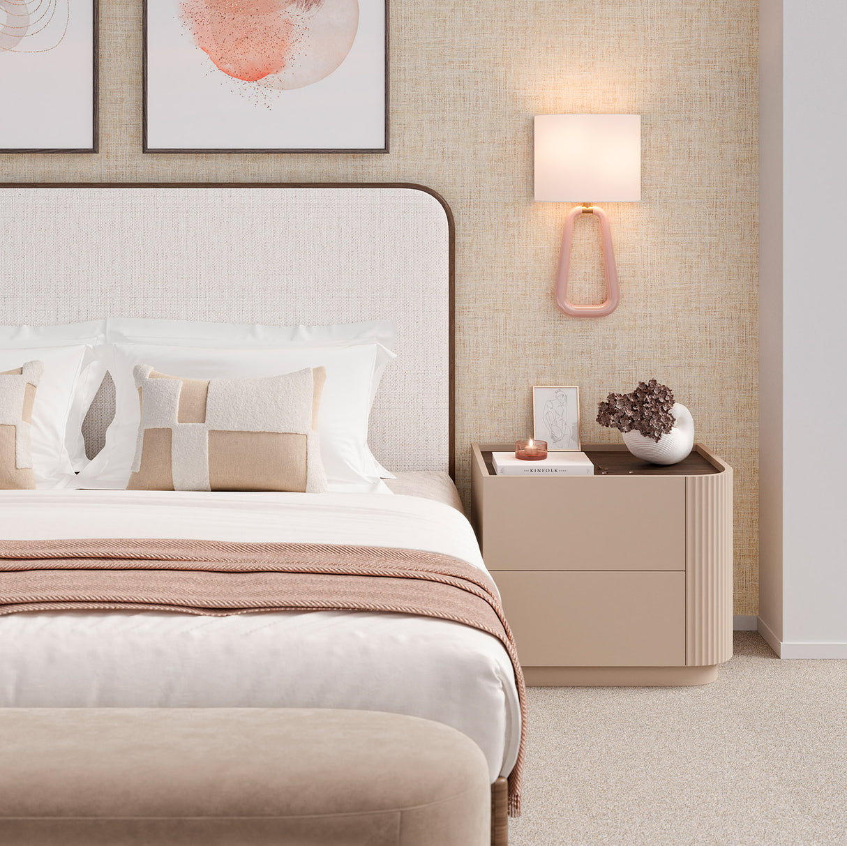 Primary bedroom with shades of blush and beige in a modern style, with the Boden Wall Sconce in Blush & Brass as a bedside light.