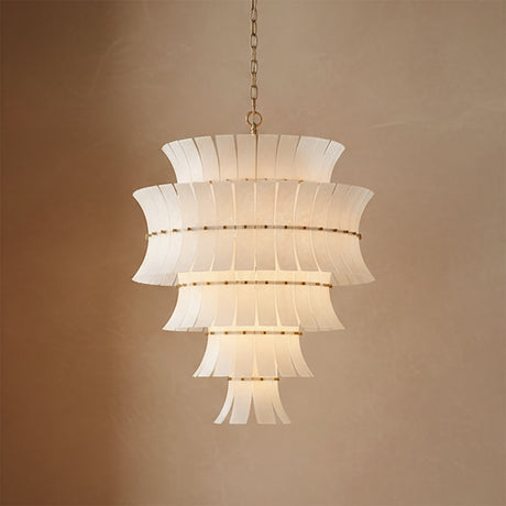 Brielle 21 Light Chandelier 30, White Art Glass with Aged Brass - A tiered chandelier hangs against a tan wall.