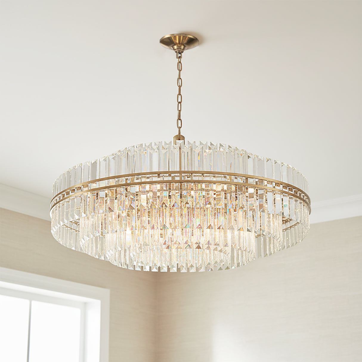 Maxwell 32 Light Chandelier 41" Crystal with Aged Brass for Modern home with Beige Wallpaper