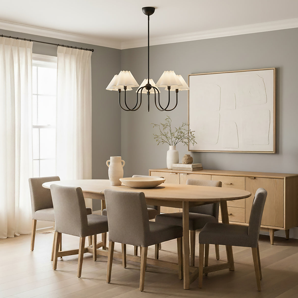 Rory 5 Light Chandelier 31, Matte Black styled in a Modern Dining Room with wood floors and neutral walls.