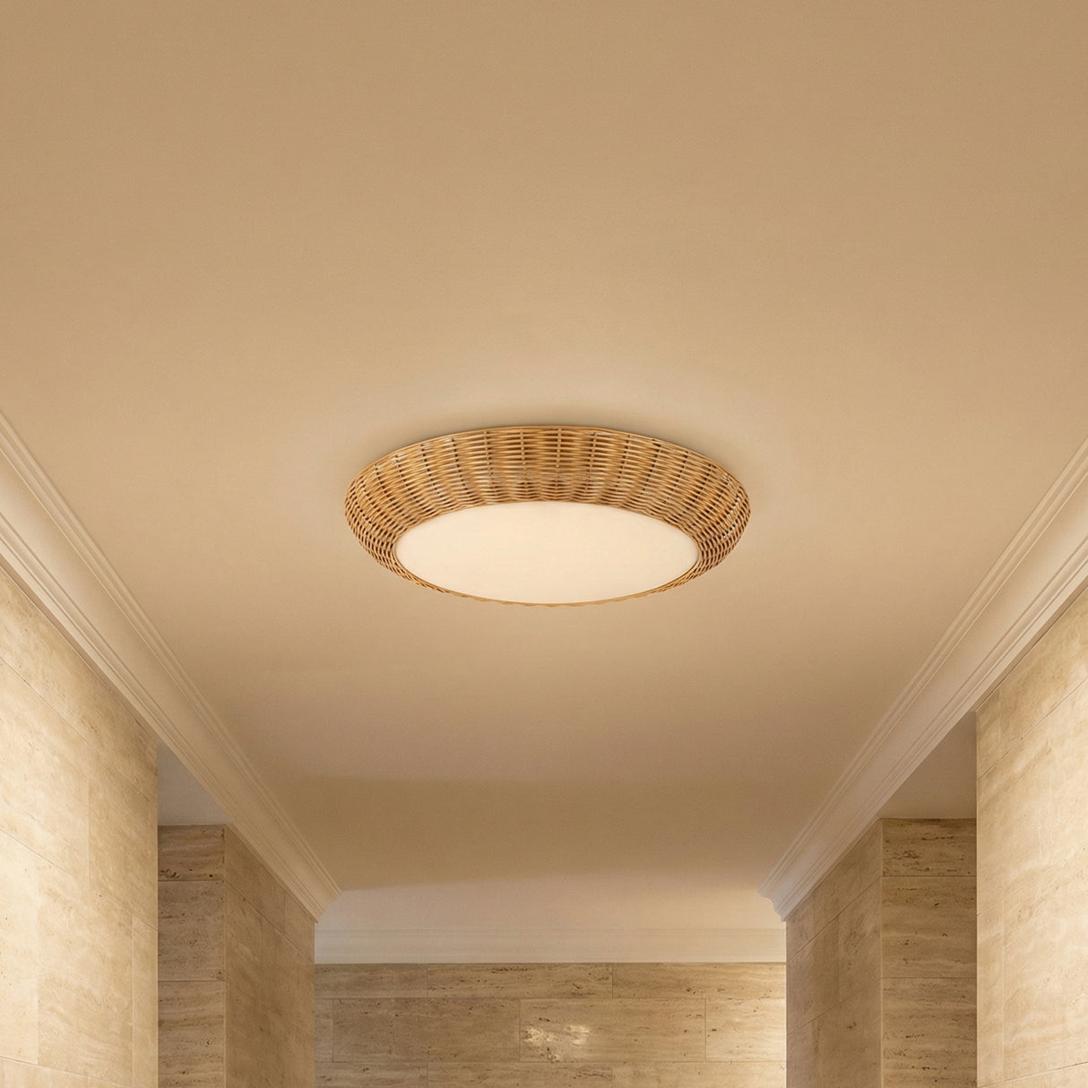 Miramar Flush Mount 21", Rattan and Opal Glass Natural woven flush mount in a Coastal Entryway with light stone walls.