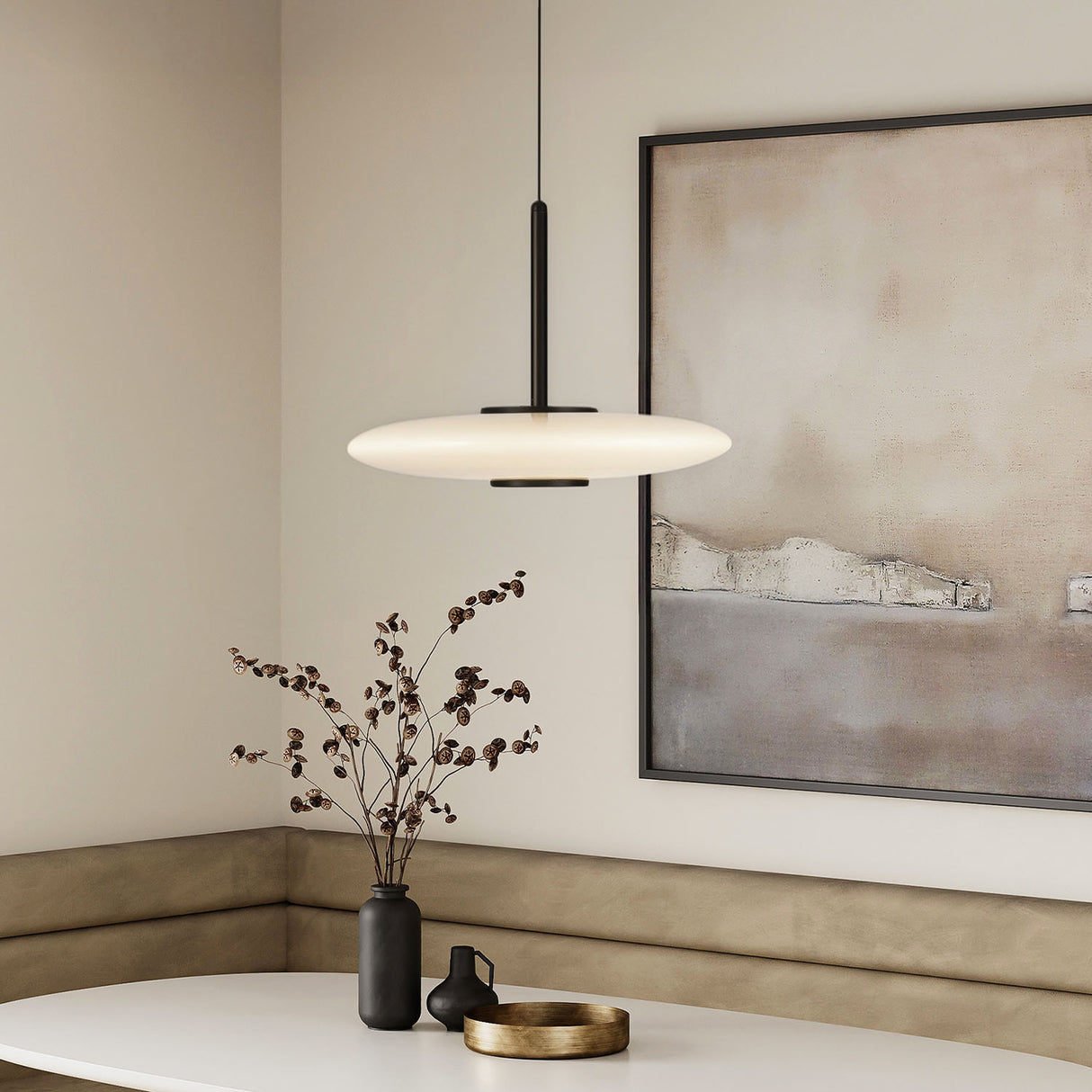 Callan LED Pendant 18", Black and Opal Glass in a modern dining nook.