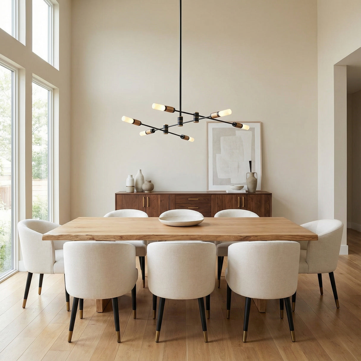 Roscoe 6 Light LED Chandelier 32", Black and Brass geometric Chandelier in a Modern Dining Room with a live-edge wood dining table.